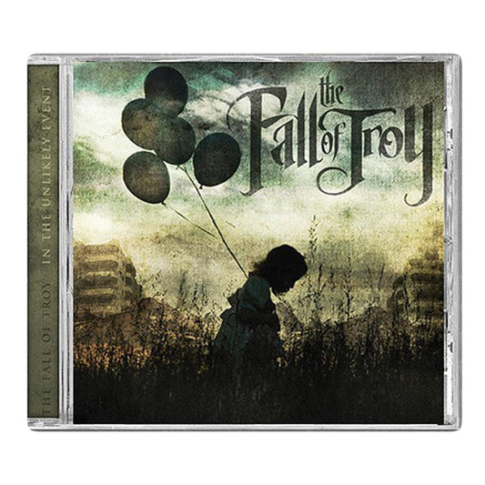 The CD cover for The Fall of Troy’s In the Unlikely Event Deluxe Edition features a child’s silhouette holding black balloons in a grassy field, with tall buildings, a cloudy sky, and the band’s logo at the top right.