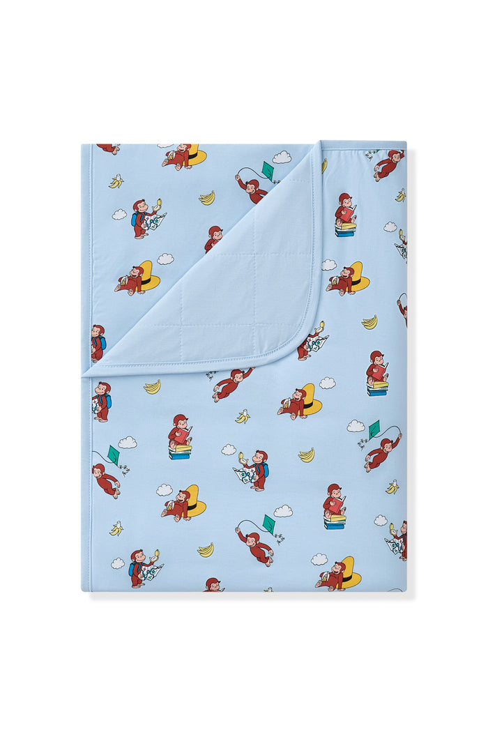 Blue Toddler Blanket in Curious George 1.0 print on a white background