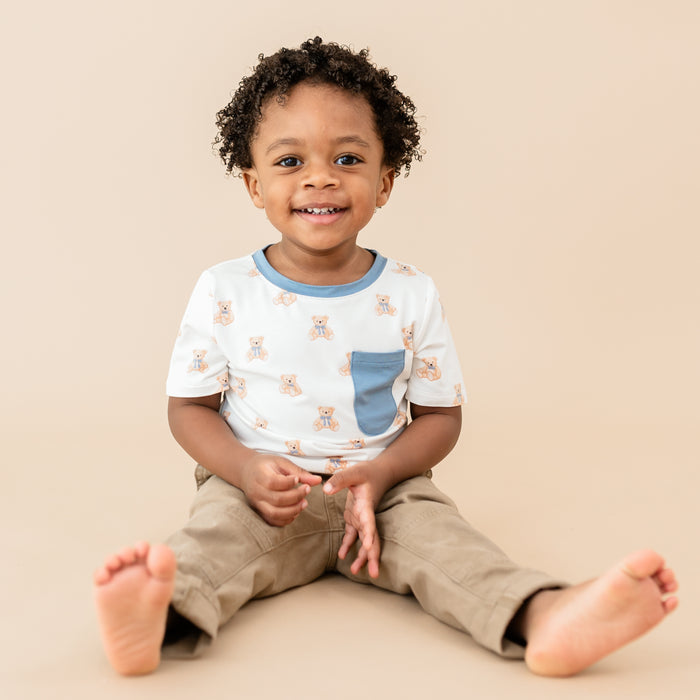 Boy sitting wearing Toddler Crew Neck Tee in Teddy Bear