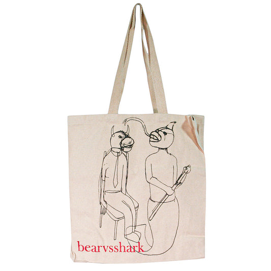 The bearvsshark beige 14x14 canvas tote bag features line art of a bear-headed figure on a stool and a shark-headed figure with a staff. "Bearvsshark" is printed in red, making it perfect for daily use.