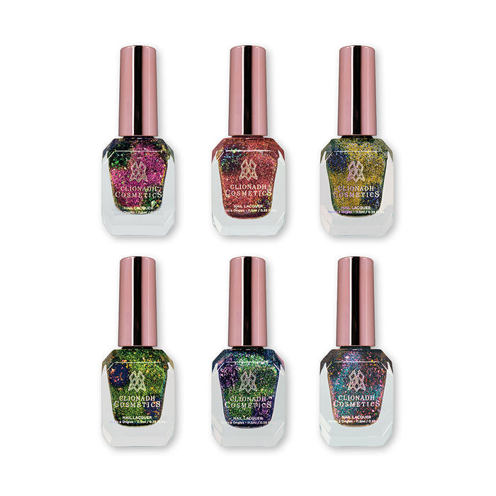 Set of six nail polish bottles containing Nail Lacquers from the Trip-Adelic Nail Lacquer Bundle, on a white background.