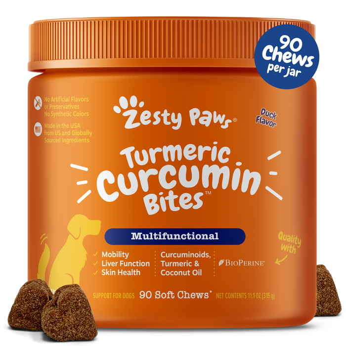 Orange jar of Zesty Paw turmeric curcumin bites for dogs with duck flavor, 90 soft chews, brown treat pieces displayed in fro
