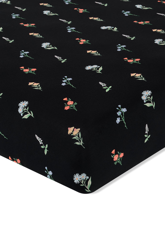 Black Twin Sheet in Wildflower print on a white background