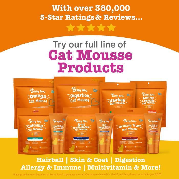 Collection of orange Zesty Paw cat mousse pouches and tubes in various formulas displayed against orange and yellow backgroun