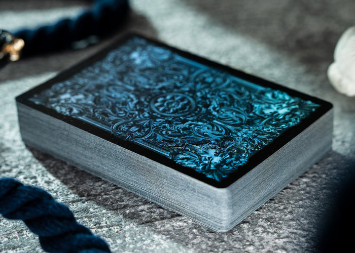 Decorative box with intricate design on a textured surface