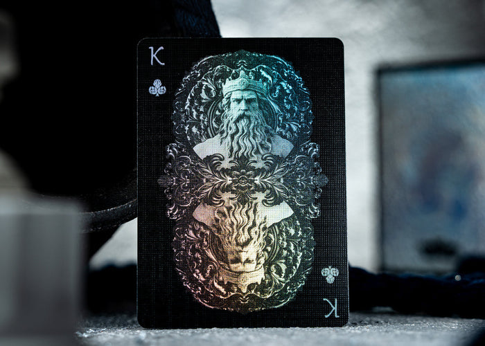 Playing card with a king and tiger design on a blurred background