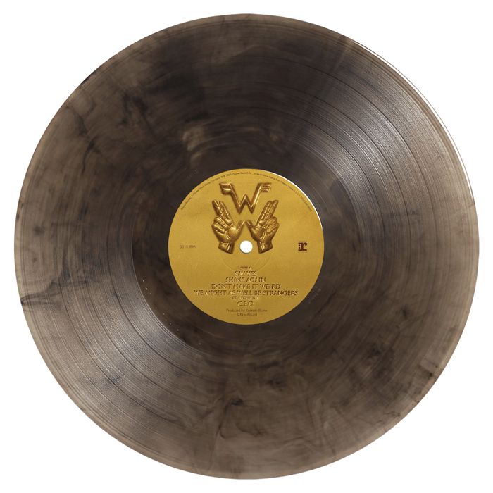 Weezer artifact wzr.004 black gold vinyl featuring a marbled black and silver record with a gold vinyl center label