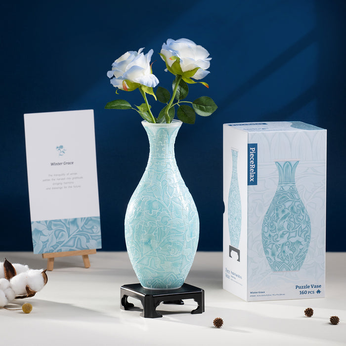 PieceRelax | Puzzle Vase -  Experience the serene beauty of winter. This puzzle vase captures the crisp elegance of the season with its intricate patterns and cool, calming hues. A refined decoration that brings peaceful charm to any space. With PieceRelax, you’ll always get there.