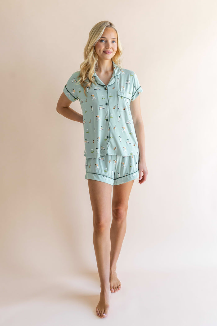 Model wearing Women's Short Sleeve Pajama Set in Golf print on beige background