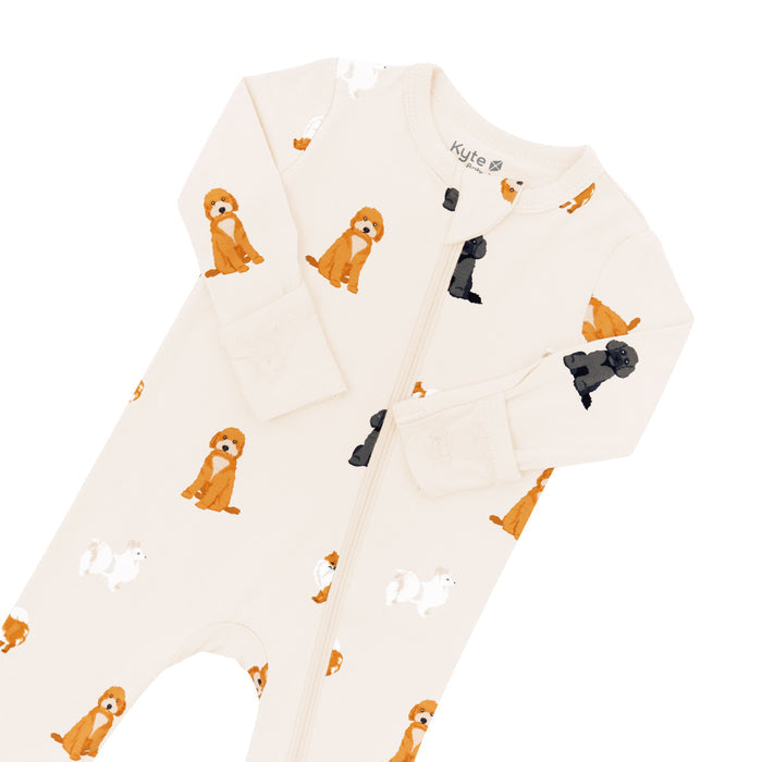 Zippered Romper in Fluffy Dog close up showing the zipper garage and fold over cuffs